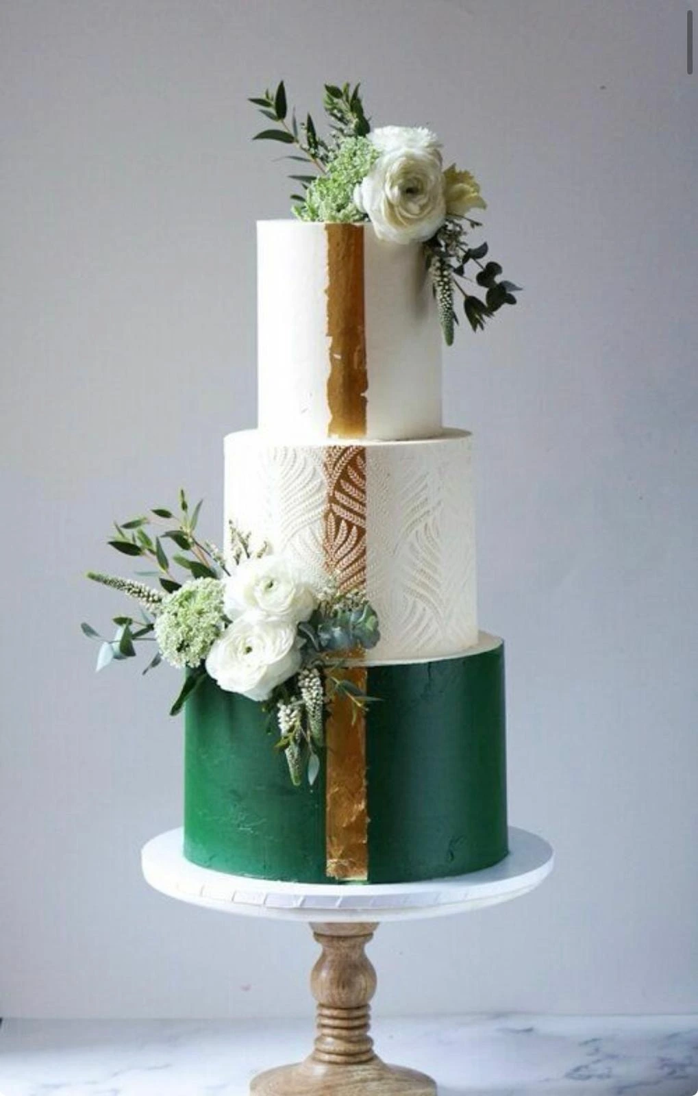 Botanical and gold tiered cake design