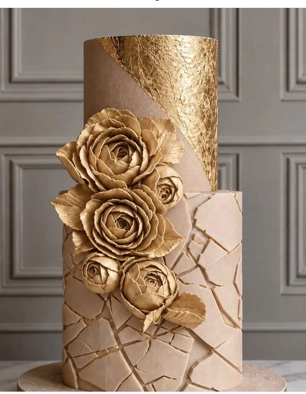 Champagne and gold celebration cake with sculpted roses