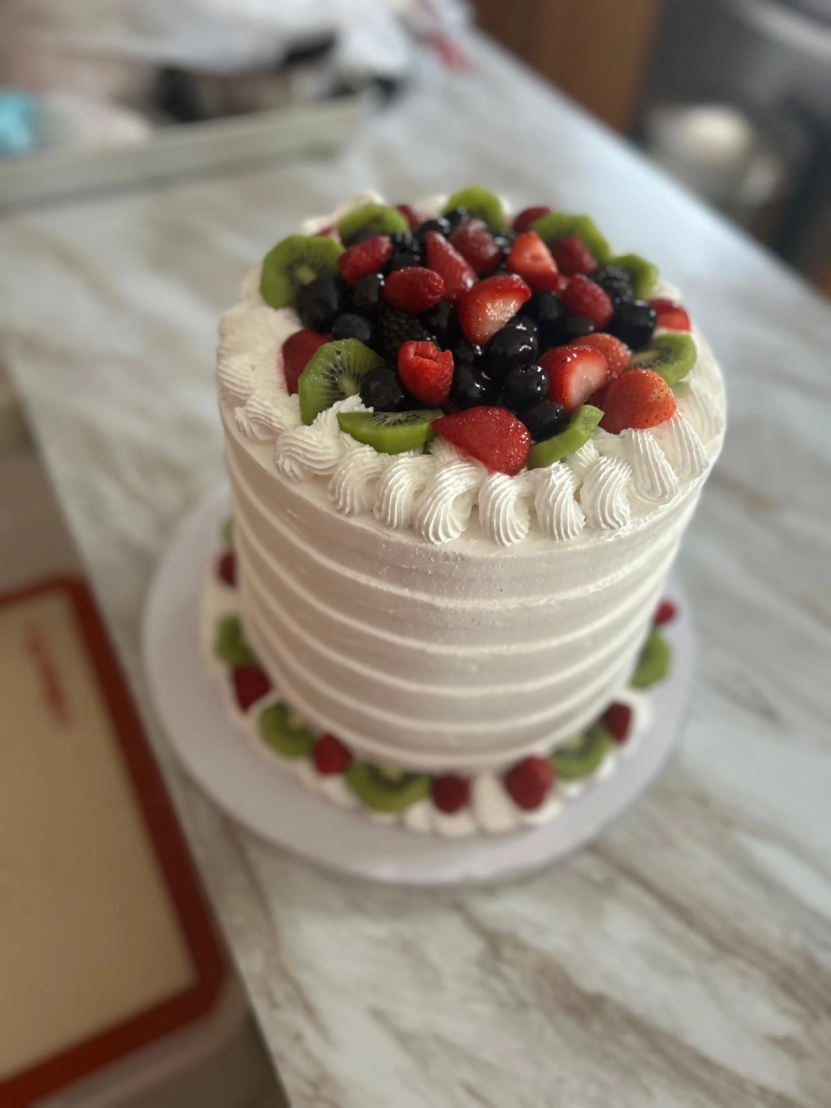 Fruit and cream celebration cake