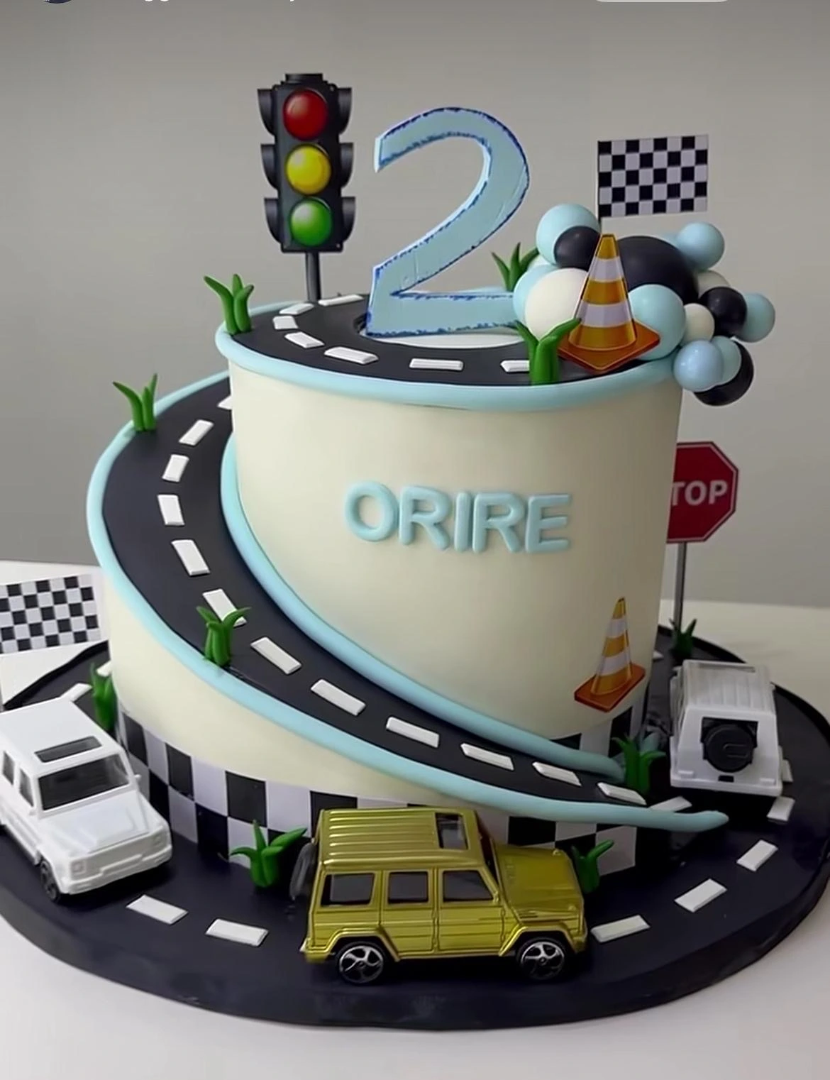 Racecar-themed birthday cake design